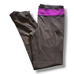 VSX Black yoga Leggings with purple metal studded waist, ruched ankles